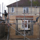 Lintels are placed and scaffolding erected